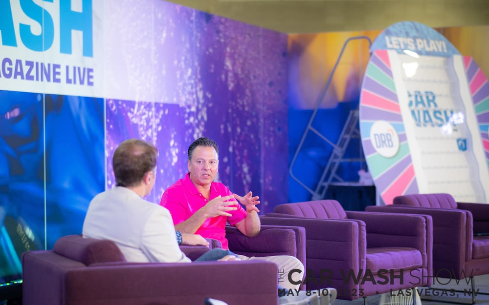 Community Impact Award winner Express Wash Concepts and CEO John Roush with Chief Marketing Officer Matt DeWolf